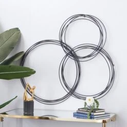 Metal Plate Overlapping Ring Wall Decor - CosmoLiving By Cosmopolitan -Safavieh Store GUEST 00e22674 bea2 45ec bc11 44126051a918