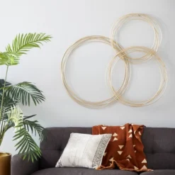 Metal Plate Overlapping Ring Wall Decor - CosmoLiving By Cosmopolitan -Safavieh Store GUEST 63c7ac7b 4fb0 4916 a08b 782b1171fd91
