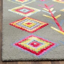 Dakine Geometric Tufted Area Rug - Safavieh